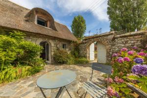 Villas Superbe chaumiere en bord de mer : photos des chambres