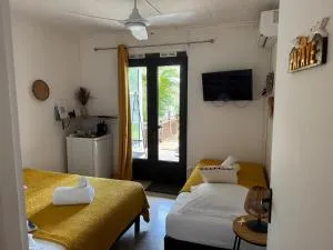 Ti kaz bo - Chambre Papaye chez l'habitant - Harmonie