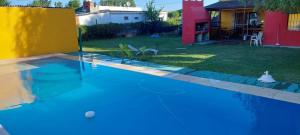 Casa con Pileta Roldan