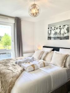 Appartements Le Domaine Reserve , parking et ecrin de verdure : photos des chambres