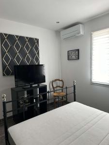 B&B / Chambres d'hotes Les lauriers fleuris : photos des chambres