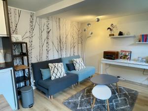 Maisonnette dans jardin partagé - 3hvězdičkové hotely ve městě Colombes