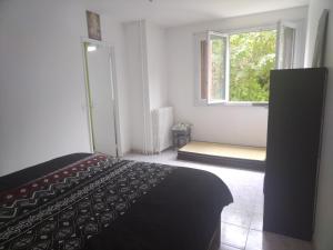 Appartements Appartement familial face a un square arbore : photos des chambres