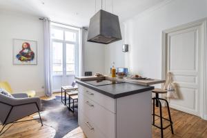 Appartements Le Louvre - Appart proche thermes chic & douillet : photos des chambres