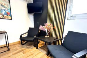 Appartements Studio Preto - Confort moderne - Terrasse - Parking gratuit - Non fumeur : photos des chambres