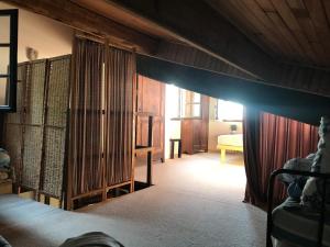 Appartements La Petite Maison sur la Colline : photos des chambres
