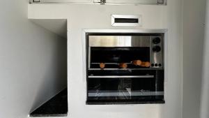 GN01- Centro | 2 Quartos| 2 Banheiros | Garagem