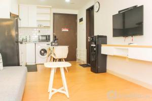 Nice and Elegant 1BR Apartment at Mustika Golf Residence By Travelio