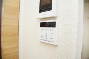 NYHotel 1 新宿2階建て4室1バスルーム1シャワー2トイレ