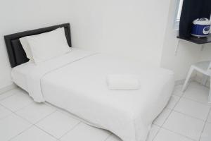 Comfort Studio No Kitchen Apartment at Aeropolis Residence By Travelio