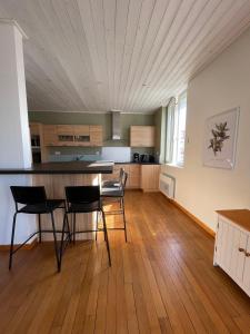 Appartements Le logis des Halles : photos des chambres
