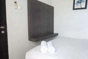 Best Deal and Comfy 2BR Apartment at Puri Mas By Travelio