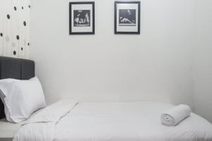 Best Deal and Comfy 2BR Apartment at Puri Mas By Travelio