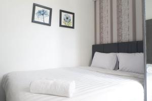Best Deal and Comfy 2BR Apartment at Puri Mas By Travelio