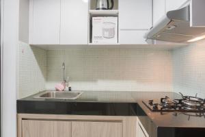Minimalist and Comfort Studio Apartment at Springhill Terrace Residence By Travelio