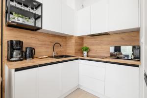 Nadmorski Apartament z Parkingiem by Rent like home