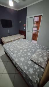 Apto em Canto do Forte 50 m da praia