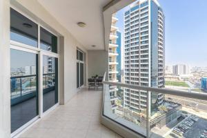 Vogue Vacation Homes, Al Fahad Tower, Al Barsha Heights near Mall of The Emirates, Walking Distance to DIC Metro Station, Two Bedroom Apartment with Balcony and Access to all Amenities