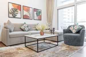 Vogue Vacation Homes, Al Fahad Tower, Al Barsha Heights near Mall of The Emirates, Walking Distance to DIC Metro Station, Two Bedroom Apartment with Balcony and Access toAmenities