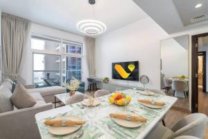 Vogue Vacation Homes, Al Fahad Tower, Al Barsha Heights near Mall of The Emirates, Walking Distance to DIC Metro Station, Two Bedroom Apartment with Balcony and Access toAmenities