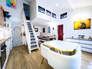 Maisons de vacances Charmante petite maison avec jardin : photos des chambres