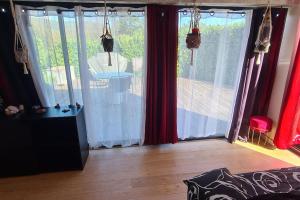 Maisons de vacances Charmante petite maison avec jardin : photos des chambres