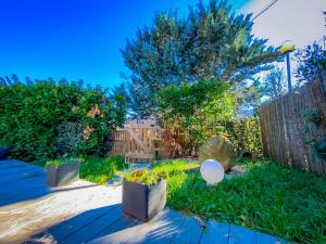 Maisons de vacances Charmante petite maison avec jardin : photos des chambres