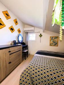 Maisons de vacances Charmante petite maison avec jardin : photos des chambres