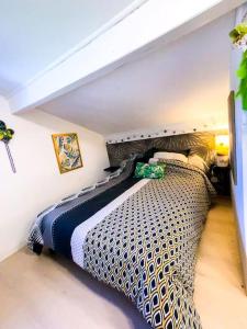 Maisons de vacances Charmante petite maison avec jardin : photos des chambres