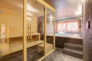 Maisons de vacances Chalet Niyama - Avec jacuzzi et station a pied : photos des chambres
