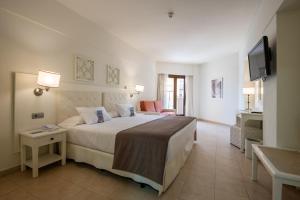 Family Room with Side Sea View room in Iberostar Isla Canela