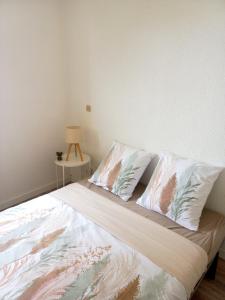 Appartements Appartement Bambou : photos des chambres