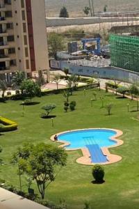 Enzi Heights Apartments - Cozy 1 bedroom near Eka Hotel, Pool, Gym, Lift