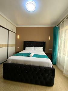 Enzi Heights Apartments - Cozy 1 bedroom near Eka Hotel, Pool, Gym, Lift