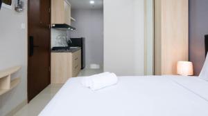 Best Choice and Nice Studio Apartment at Grand Dharmahusada Lagoon By Travelio