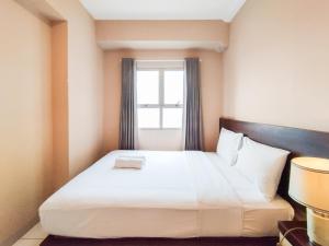 Best Deal 2BR Apartment at Mekarwangi Square Cibaduyut By Travelio