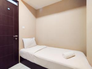 Best Deal 2BR Apartment at Mekarwangi Square Cibaduyut By Travelio