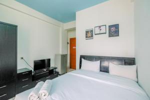 Cozy Living Studio Apartment at Margonda Residence 1 By Travelio