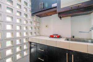 Cozy Living Studio Apartment at Margonda Residence 1 By Travelio