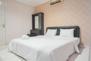 Comfort Living 1BR at The Boulevard Apartment By Travelio