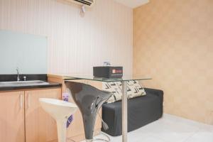 Comfort Living 1BR at The Boulevard Apartment By Travelio