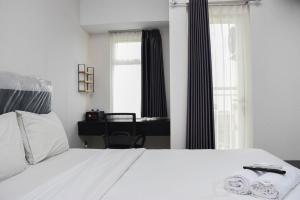 Minimalist Studio at Springlake Summarecon Bekasi Apartment By Travelio