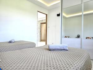 Maisons de vacances Maison Sapiac - 4pers - 2 chambres - 3 lits - Clim reversible - Terrasse ombragee et grand jardin - Piscine saison estivale : photos des chambres