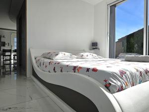 Maisons de vacances Maison Sapiac - 4pers - 2 chambres - 3 lits - Clim reversible - Terrasse ombragee et grand jardin - Piscine saison estivale : photos des chambres