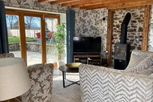 Maisons de vacances Converted Barn : photos des chambres
