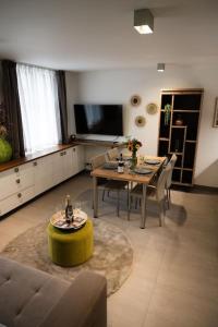 LA Poivriere in Durbuy nieuw appartement met gemeenschappelijke jacuzzi en sauna