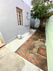 Apartamento central com pátio, 1 quadra do calçadão