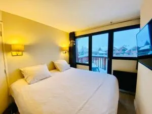 Alpe d'huez quartier jeux 50 m2-100 m des pistes - 于埃