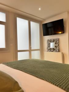 Appartements Duplex Trespoey - SPA - Place de parking : photos des chambres