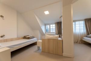 Auberges de jeunesse La Brasserie Hostel : Lit dans Dortoir Mixte de 4 Lits